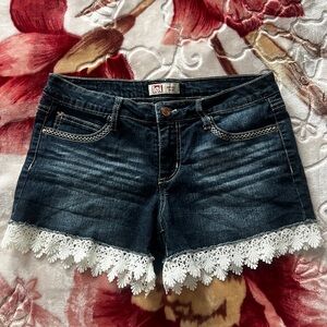 Lei navy blue denim shorts with white lace trim 🤍